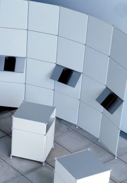 Curved display wall and plinths